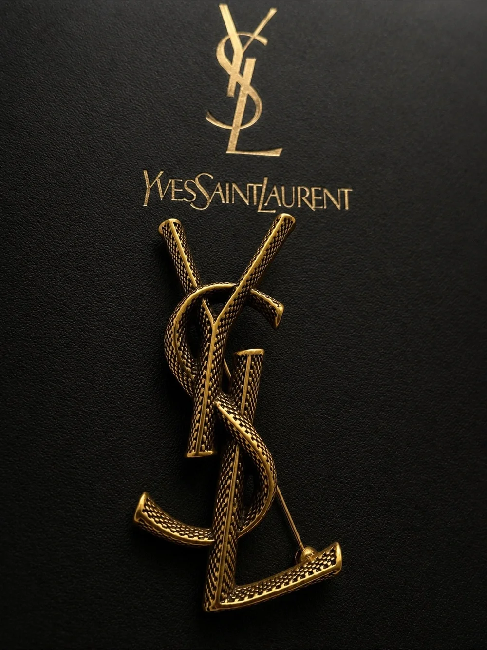 Saint Laurent Cassandre textured snake-pattern logo brooch